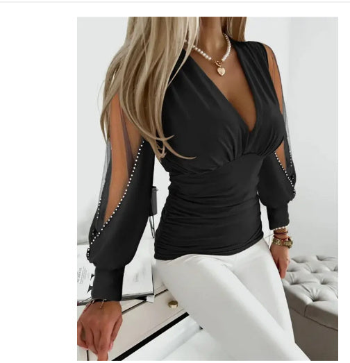 Audrey - Elegante V-halsblouse met lange mouwen en kantdetail