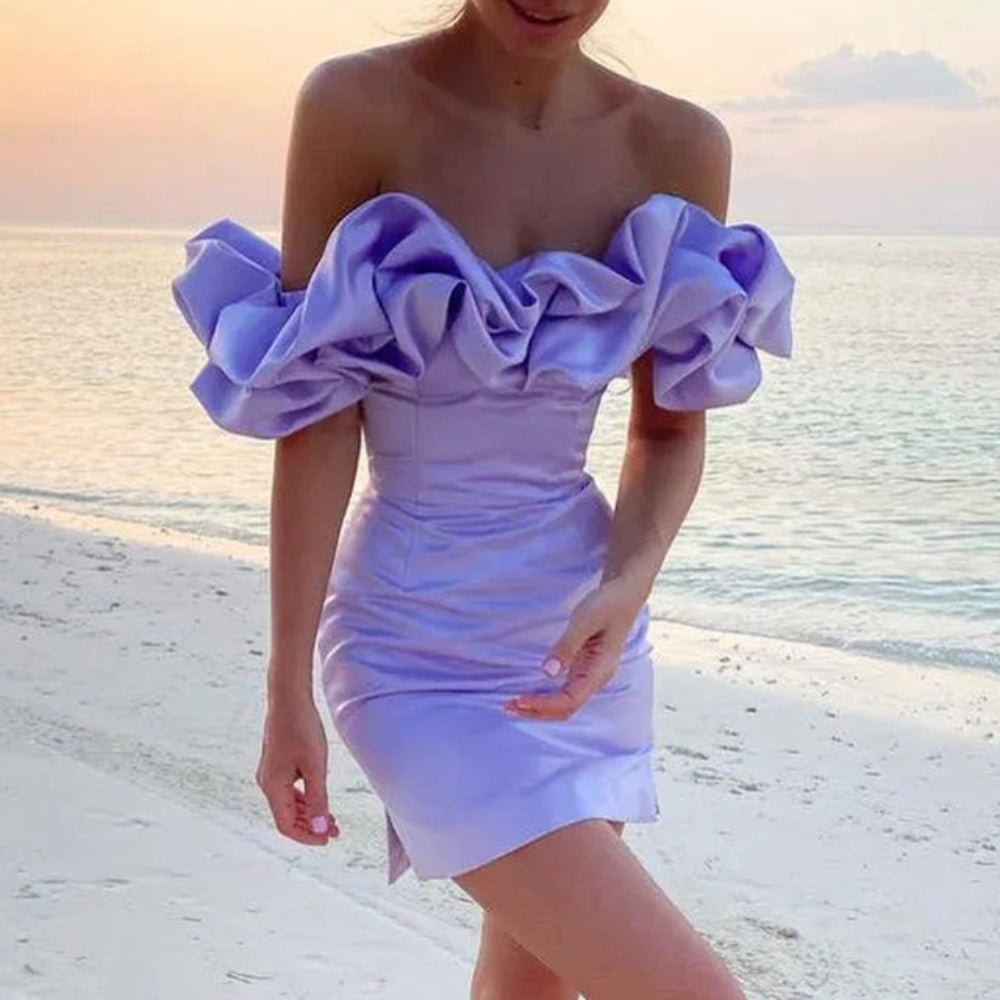 Candy – Glamoureuze off shoulder jurk met vloeiende silhouet en sierlijke ruche-accenten
