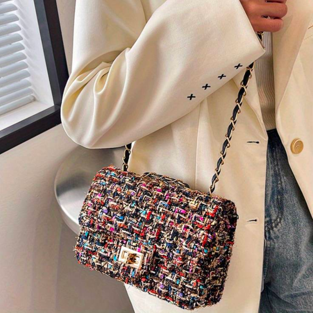 Tricia – Gestructureerde schoudertas met elegant silhouet en tijdloze charme