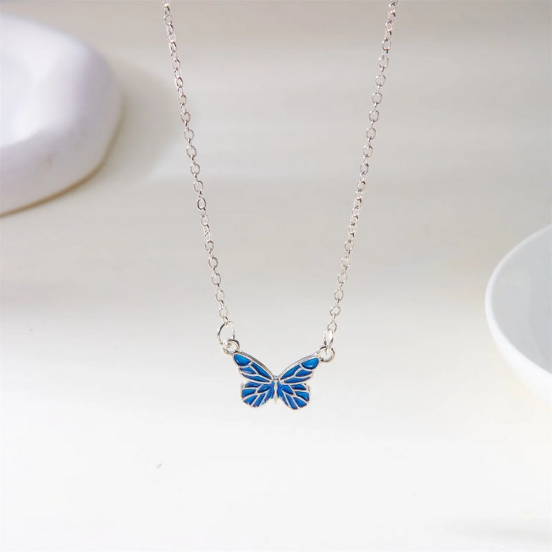 Ellie – Elegante vlinderketting en armbandset met klassieke afwerking