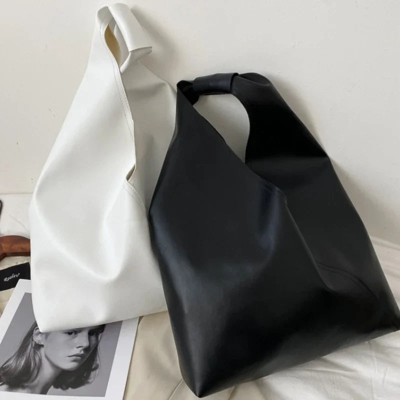 Emily – Minimalistische shopper met verstelbare riem en ruime opbergruimte