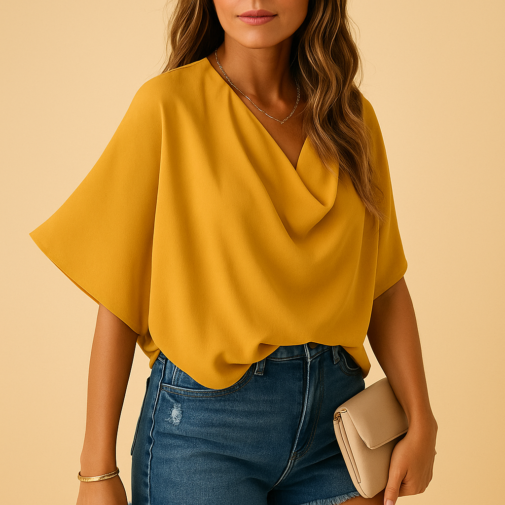 Esme – Gedrapeerde blouse met vleermuismouwen en diepe V-hals