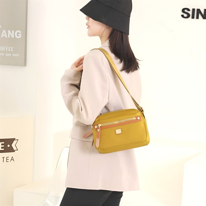 Talia – Lichtgewicht schoudertas met rits aan de voorkant en verstelbare banden