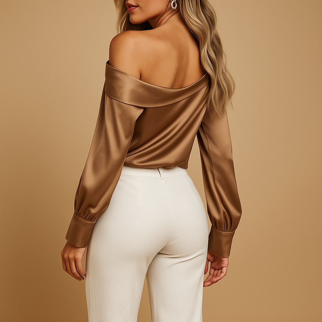 Jolie – Stijlvolle off-shoulder blouse met lange mouwen en strikdetail aan de manchetten