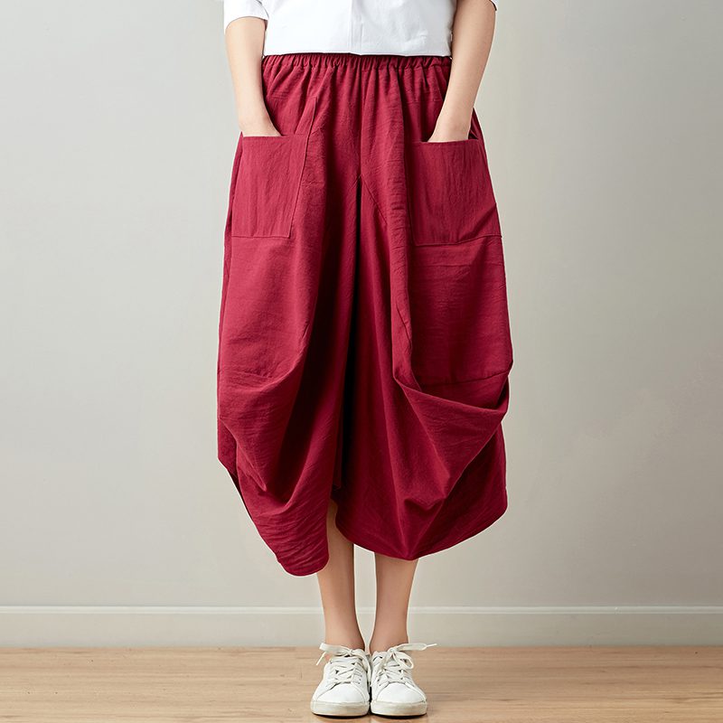 Mira – Relaxte gedrapeerde broek met praktische zakken en vloeiend silhouet