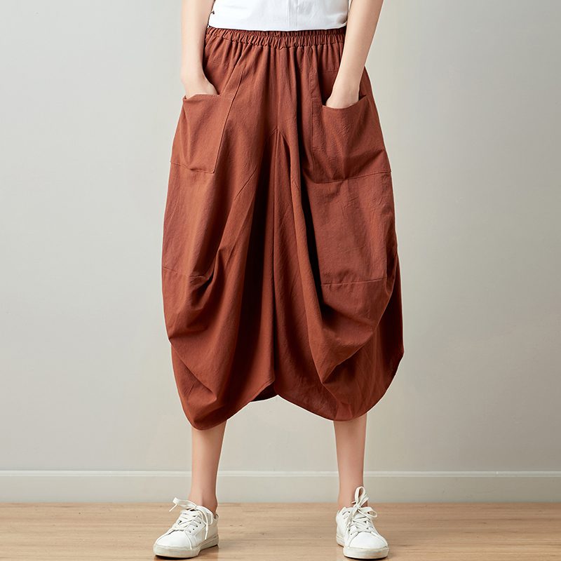 Mira – Relaxte gedrapeerde broek met praktische zakken en vloeiend silhouet