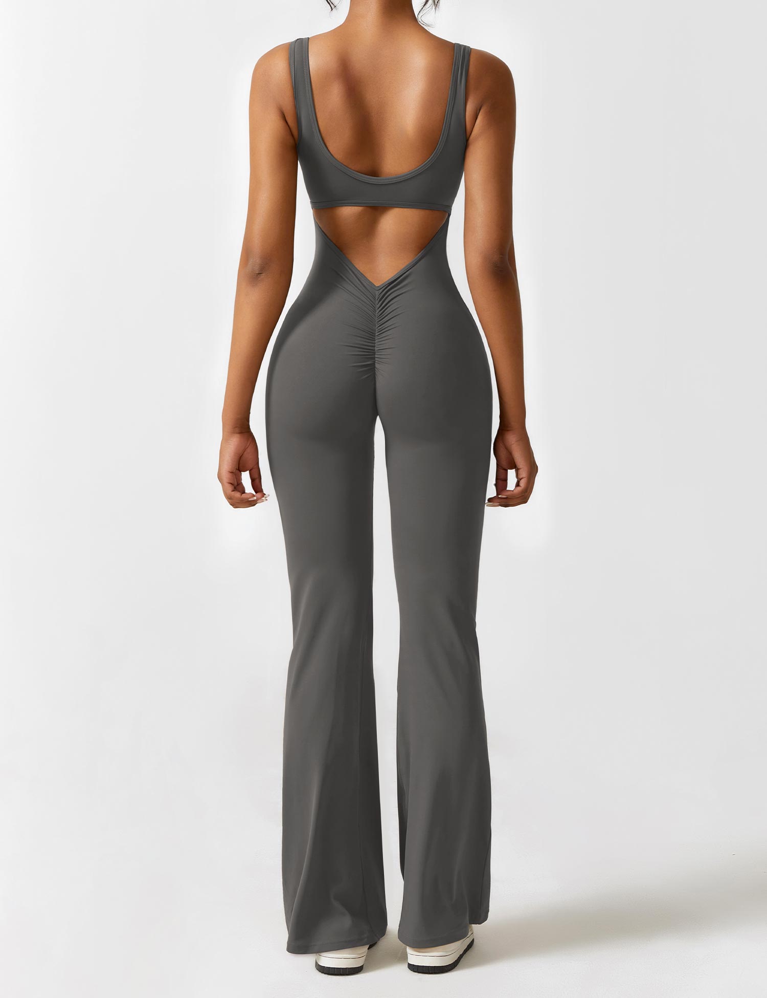Ayla – Eendelige jumpsuit met holle zijkanten en V-rugontwerp
