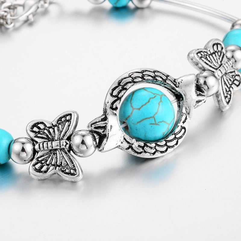 Aria – Kralenarmband met vlinderbedels en verstelbare ketting