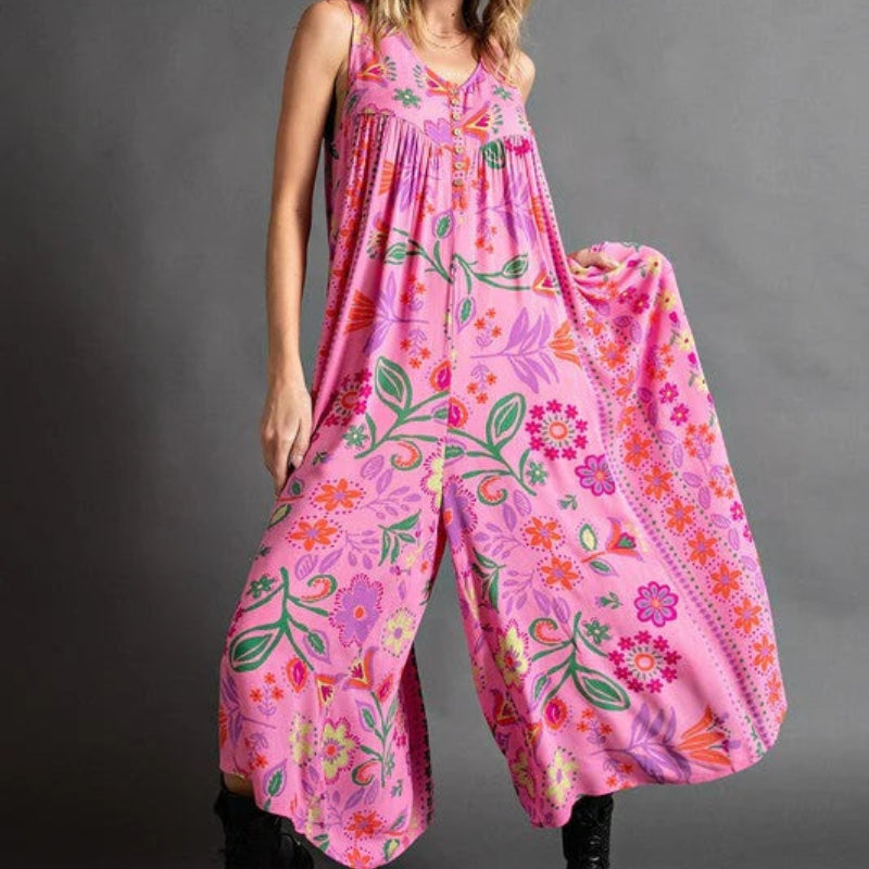 Emma – Eendelige jumpsuit met diepe V-hals en knoopsluiting aan de voorkant