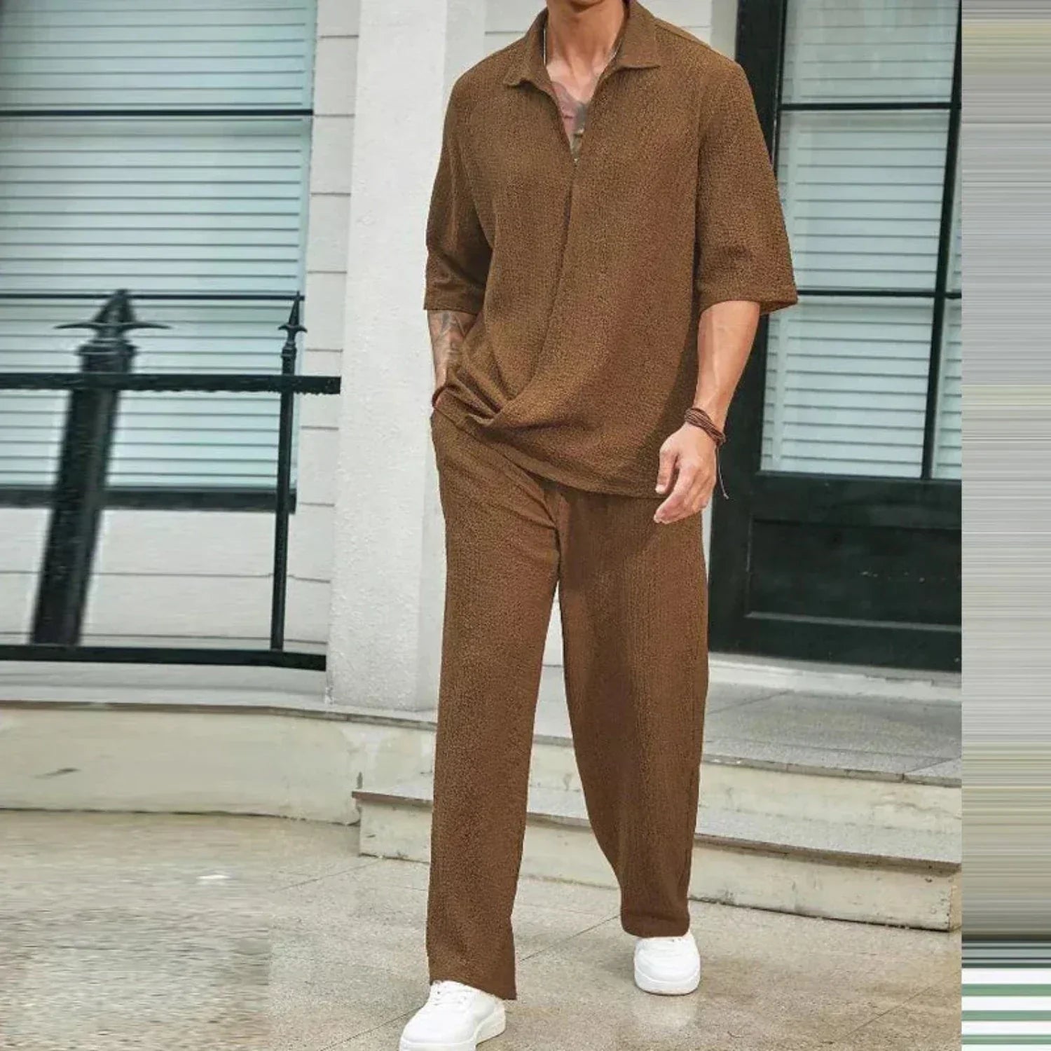 Tommy – Stijlvolle tweedelig set met half rits shirt en wijde pijpen broek