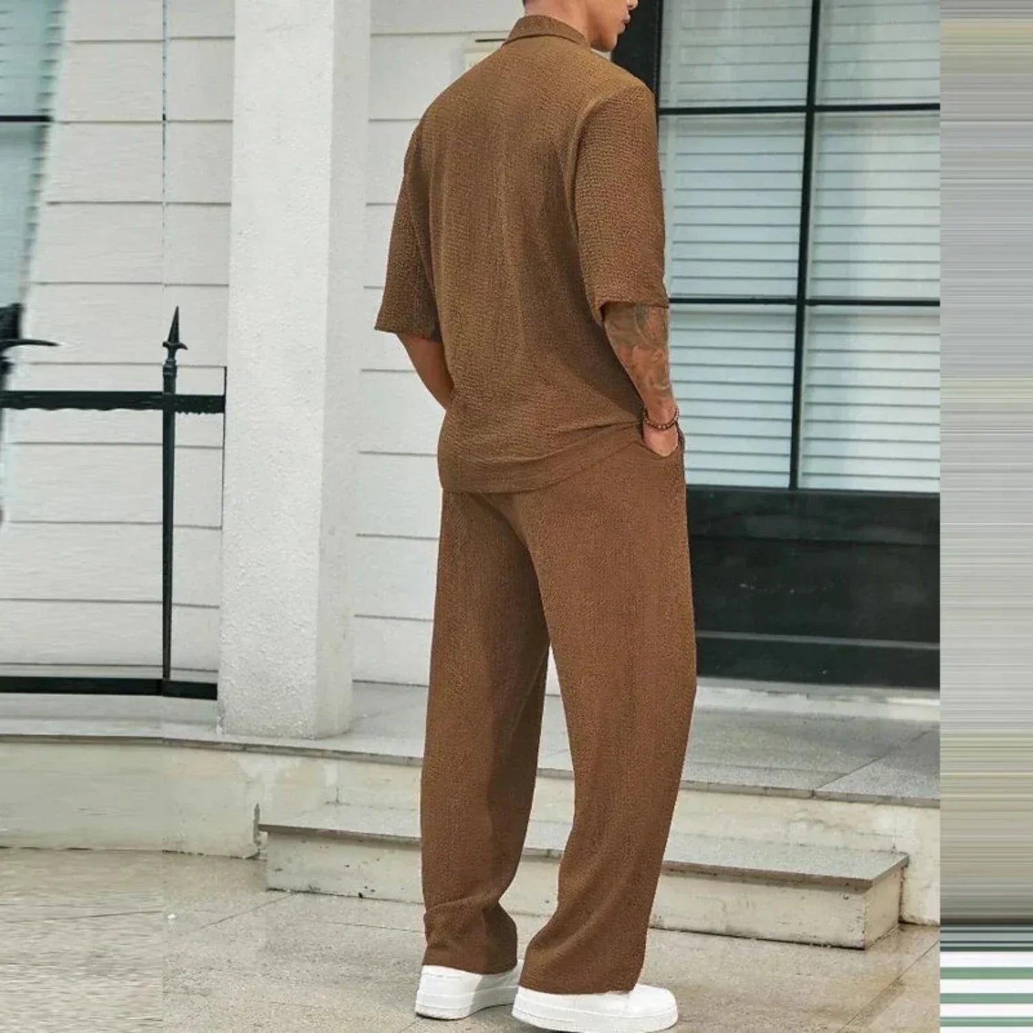 Tommy – Stijlvolle tweedelig set met half rits shirt en wijde pijpen broek