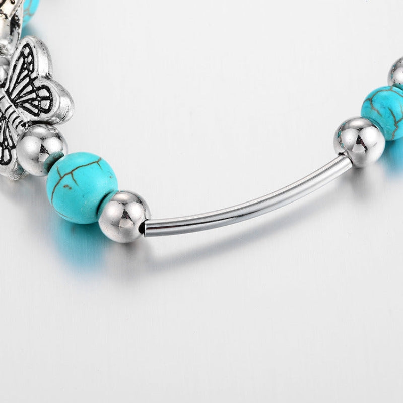 Aria – Kralenarmband met vlinderbedels en verstelbare ketting