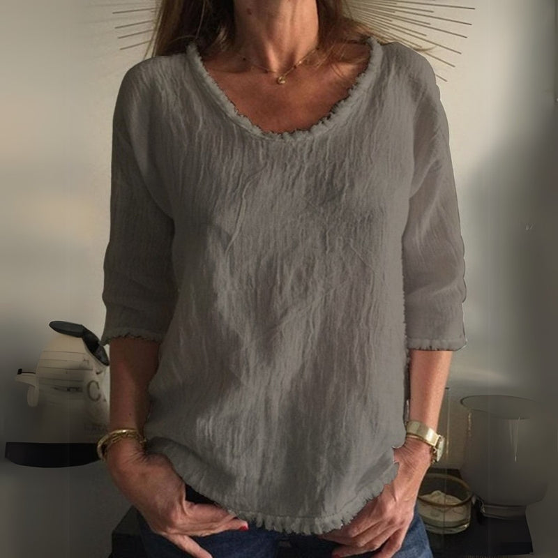 Lena – Elegante top met lange mouwen en diepe ronde halslijn