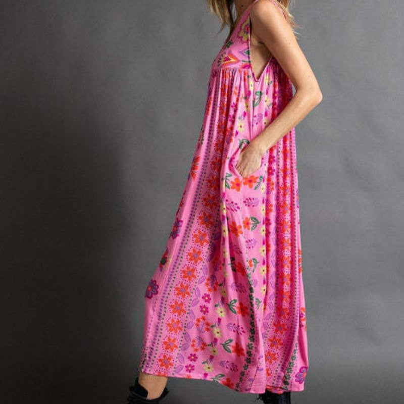 Emma – Eendelige jumpsuit met diepe V-hals en knoopsluiting aan de voorkant