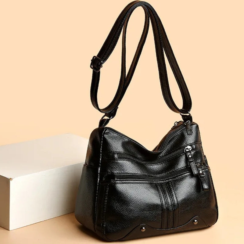 Kyra – Crossbody Tas met Verstelbare Band en Meerdere Ritsvakken