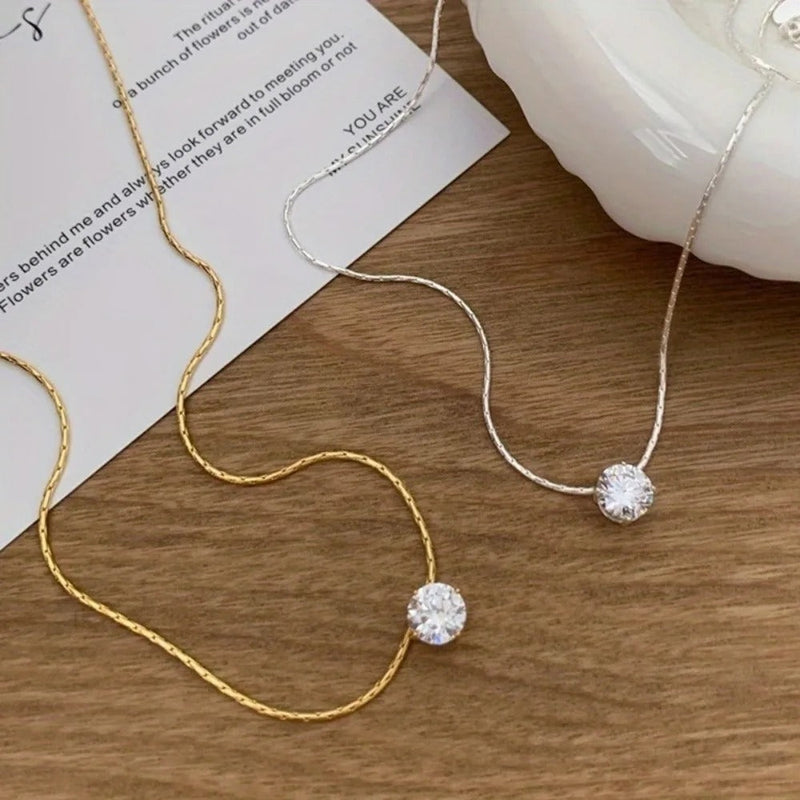 Grace – Elegante hangerketting met mini rond detail en fijn gepolijste afwerking