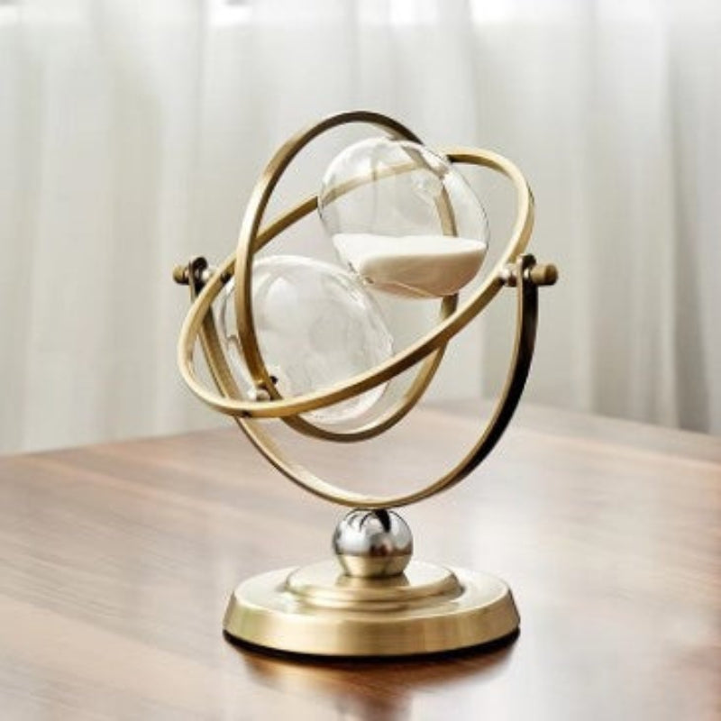 Timeloft – Artistieke ronde zandloper met atoomachtig montuur en vloeiend zanddesign