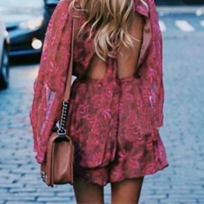 Mia – Jumpsuit met Lange Mouwen Open Rug en Bloemenprint