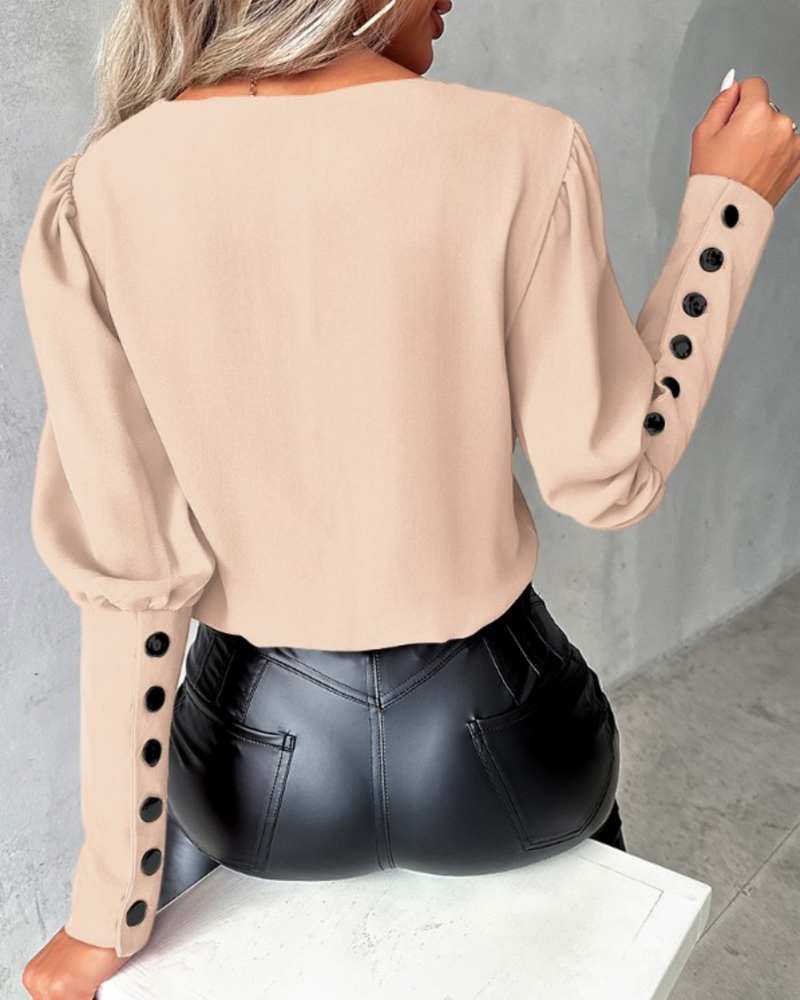 Hannah – Elegante losse pasvorm blouse met V-hals en lange mouwen