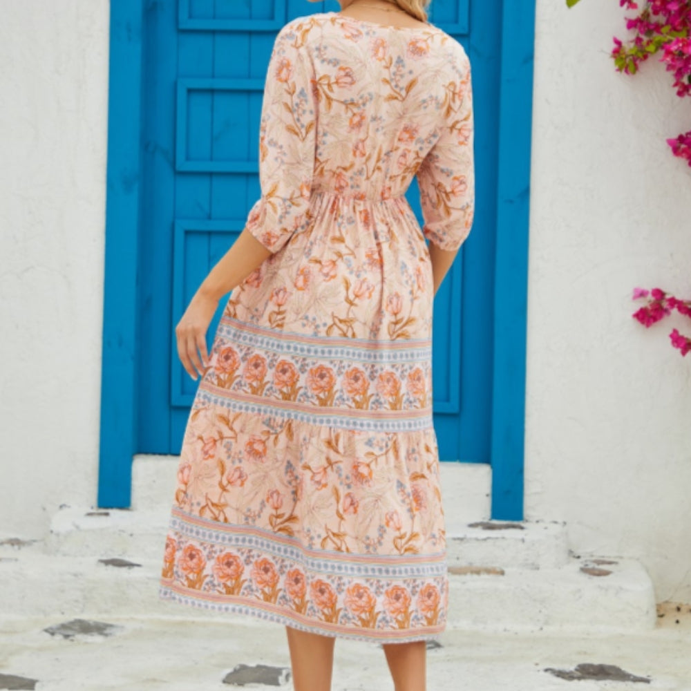 Natasha – Midi jurk met korte mouwen en diepe V-hals