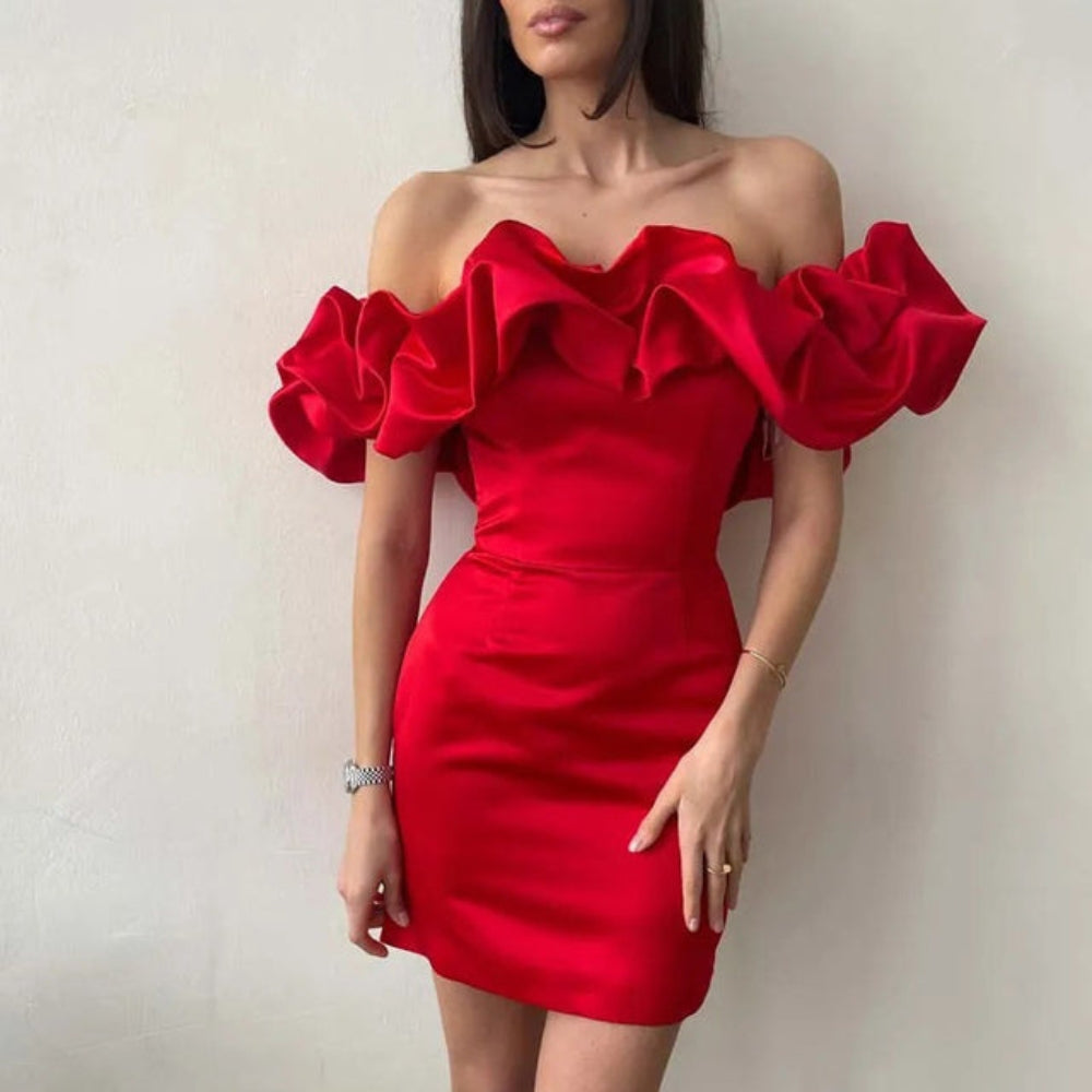 Candy – Glamoureuze off shoulder jurk met vloeiende silhouet en sierlijke ruche-accenten