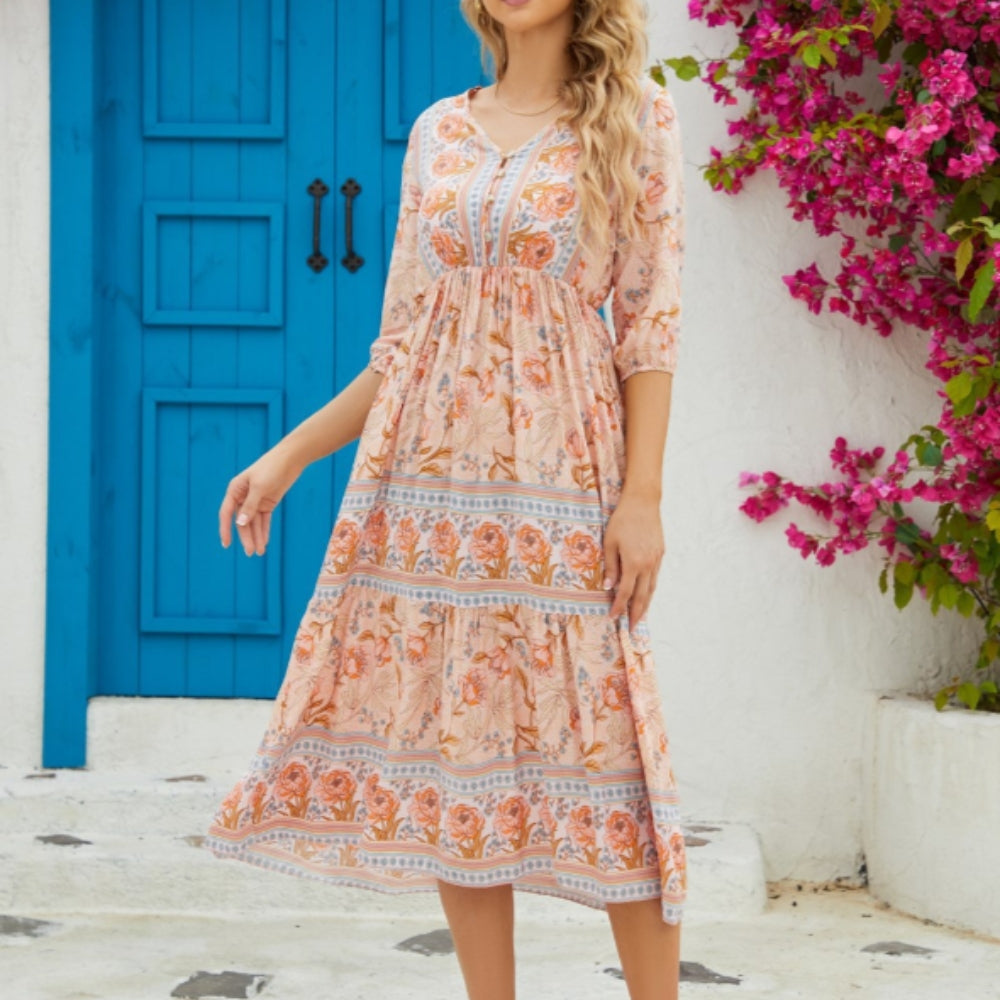Natasha – Midi jurk met korte mouwen en diepe V-hals