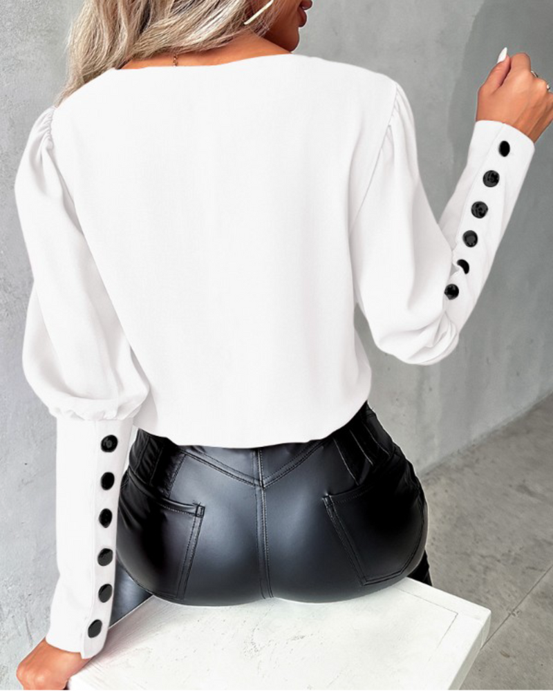 Hannah – Elegante losse pasvorm blouse met V-hals en lange mouwen