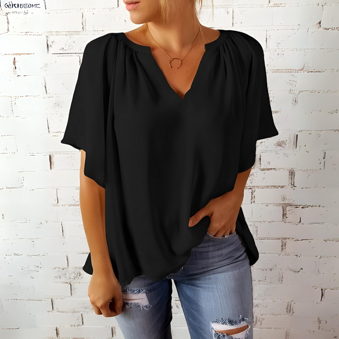 Rena - Elegante V-hals blouse met vloeiende mouwen