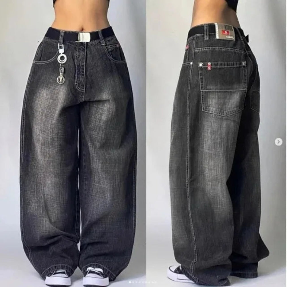 Amara – Elegante losse broek met functionele zakken en hoge tailleband