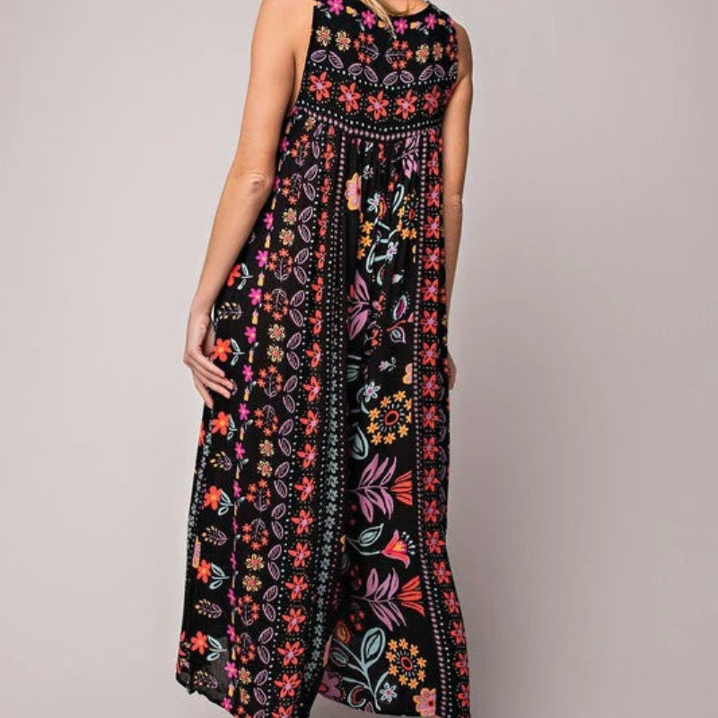 Emma – Eendelige jumpsuit met diepe V-hals en knoopsluiting aan de voorkant