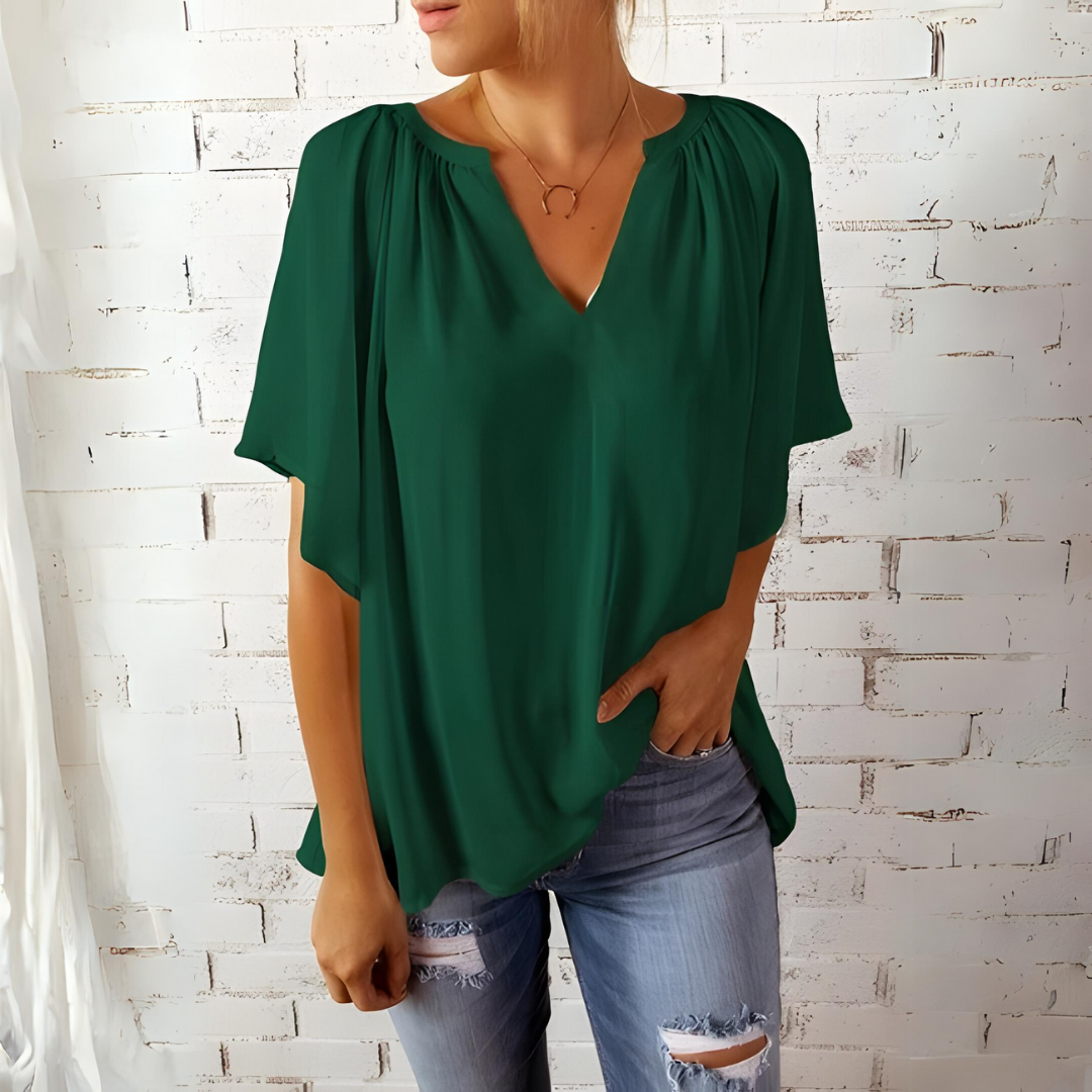 Rena - Elegante V-hals blouse met vloeiende mouwen