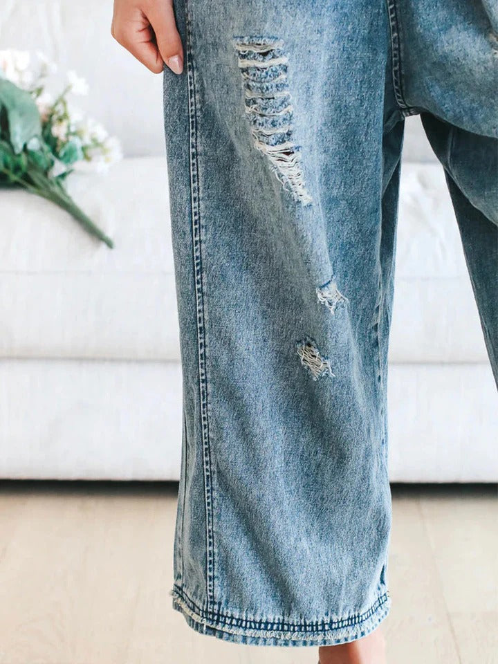 Leina - Stijlvolle losse jumpsuit met verstelbare bandjes en trendy accenten