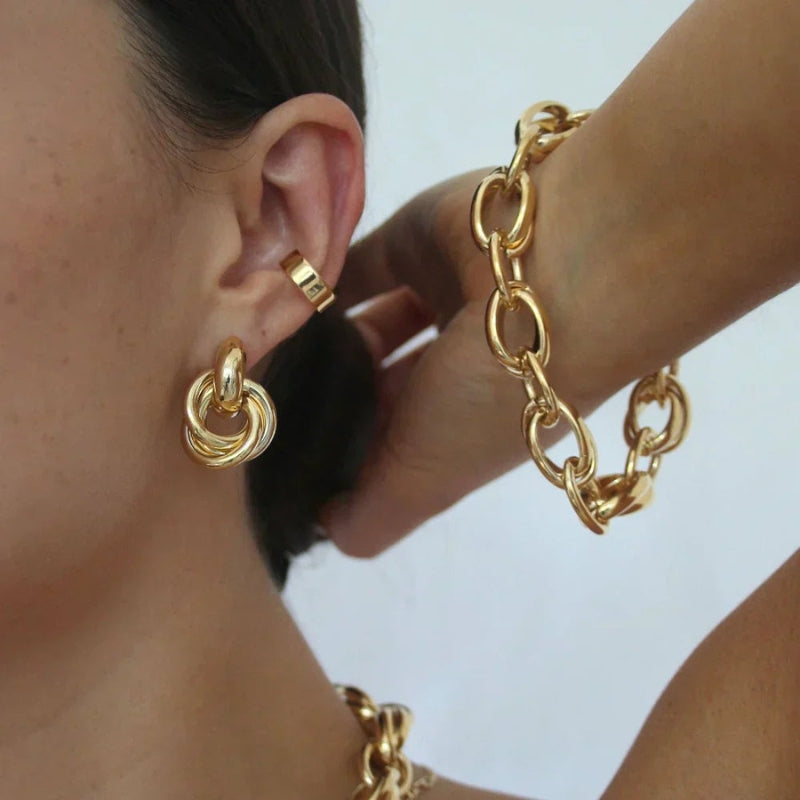 Katalina – Trendy gedraaide statement oorbellen met verweven lusontwerp en veilige pasvorm