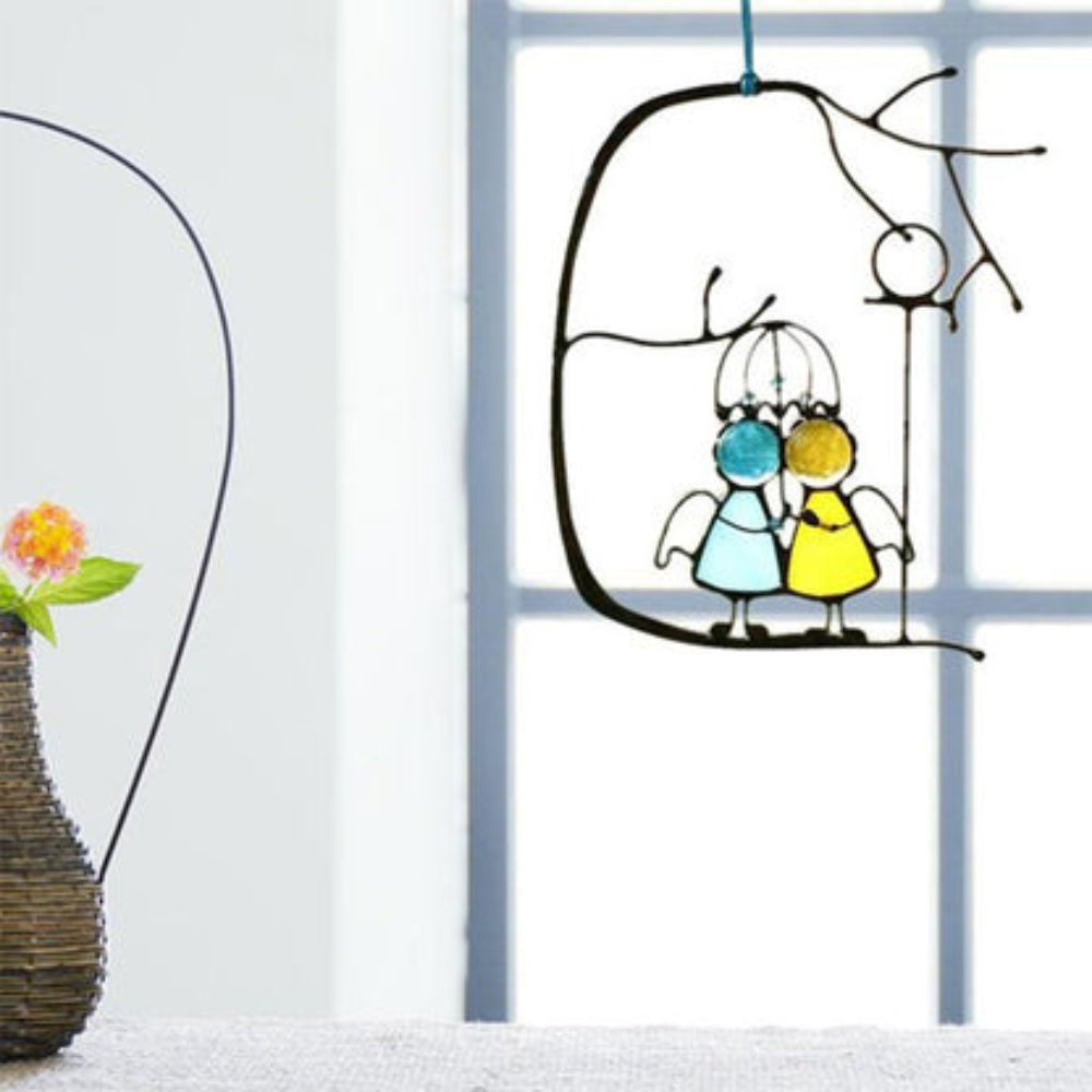 JoyWeld – Speelse hangende kunst met speelse figuren en kleurrijke decoratieve accenten