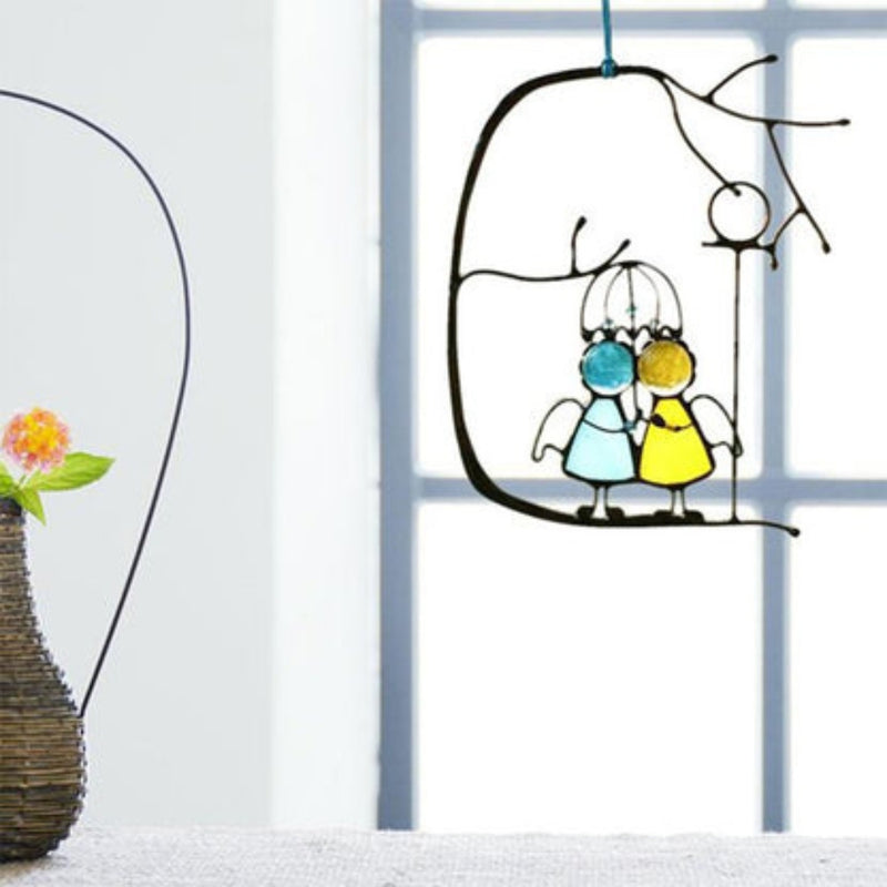 JoyWeld – Speelse hangende kunst met speelse figuren en kleurrijke decoratieve accenten