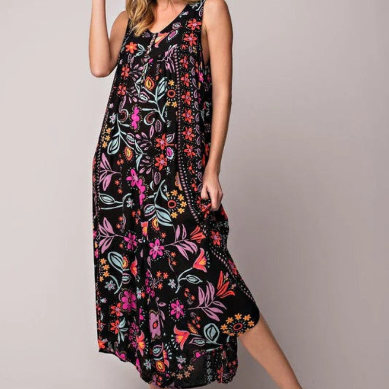 Emma – Eendelige jumpsuit met diepe V-hals en knoopsluiting aan de voorkant