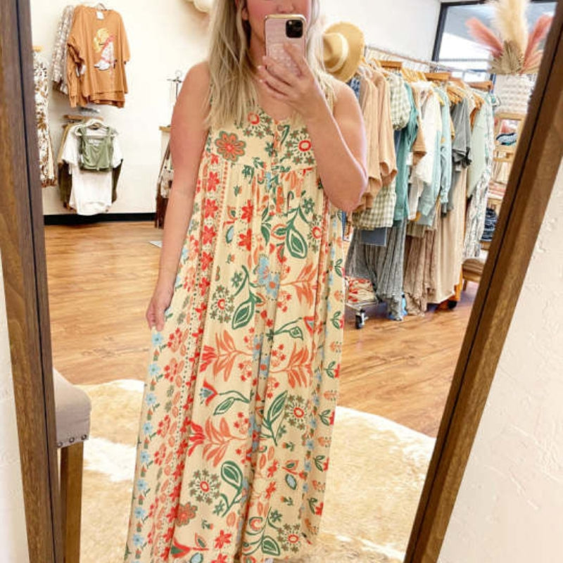 Emma – Eendelige jumpsuit met diepe V-hals en knoopsluiting aan de voorkant