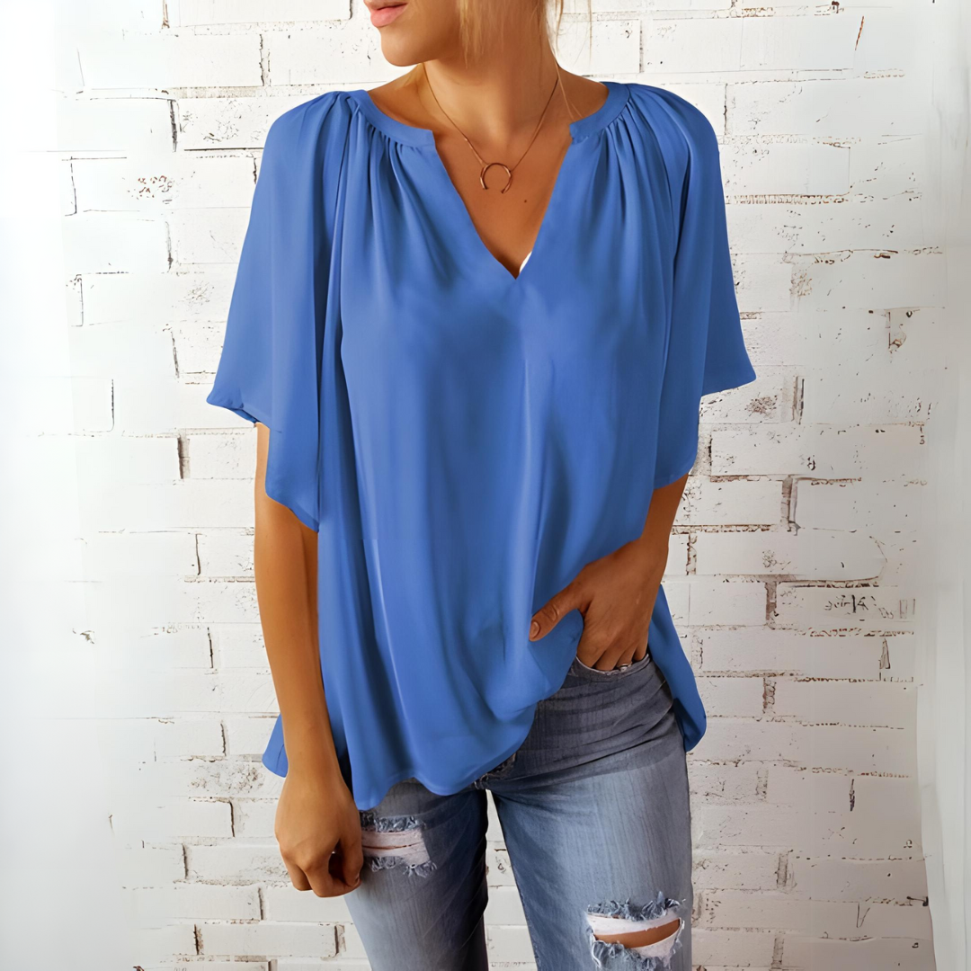 Rena - Elegante V-hals blouse met vloeiende mouwen