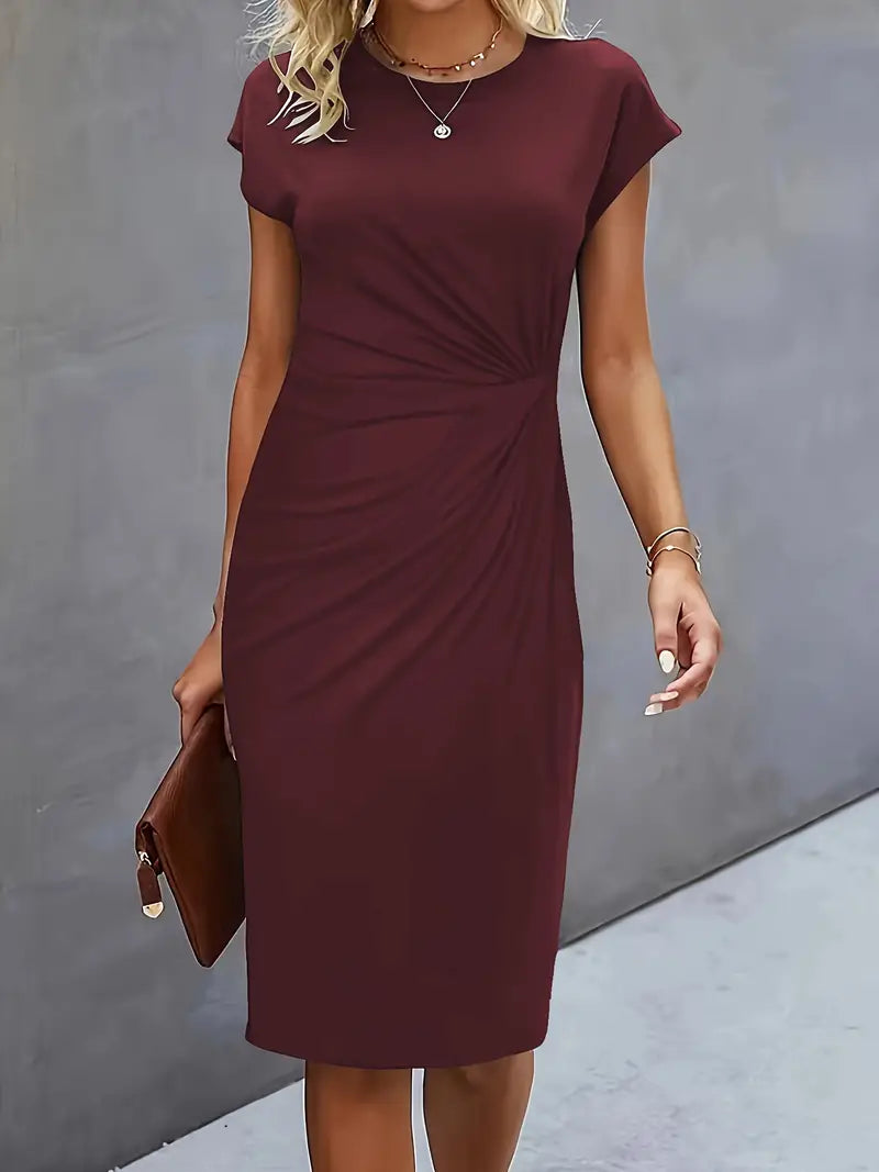 Naina - Chique midi-jurk met ronde hals en flatterend getailleerd silhouet