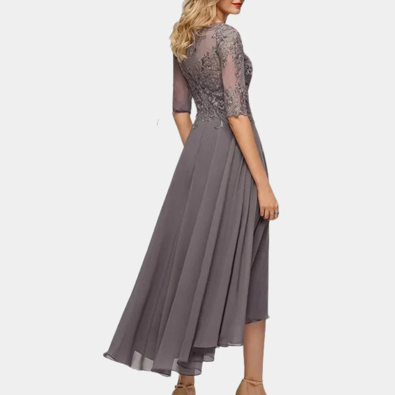 Bela– Elegante jurk met driekwartmouwen Met kantdetails en vloeiende rok