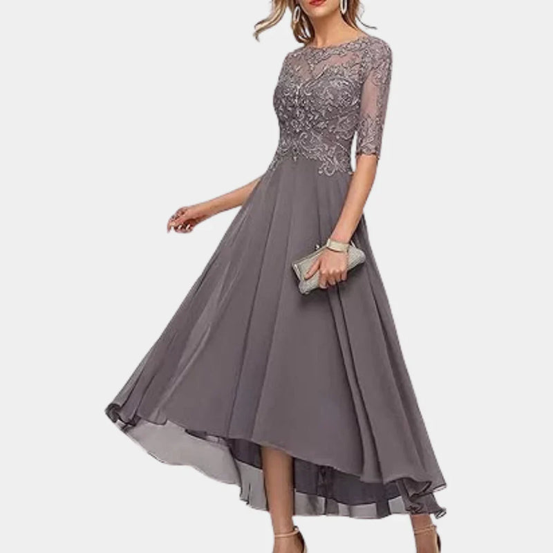 Bela– Elegante jurk met driekwartmouwen Met kantdetails en vloeiende rok