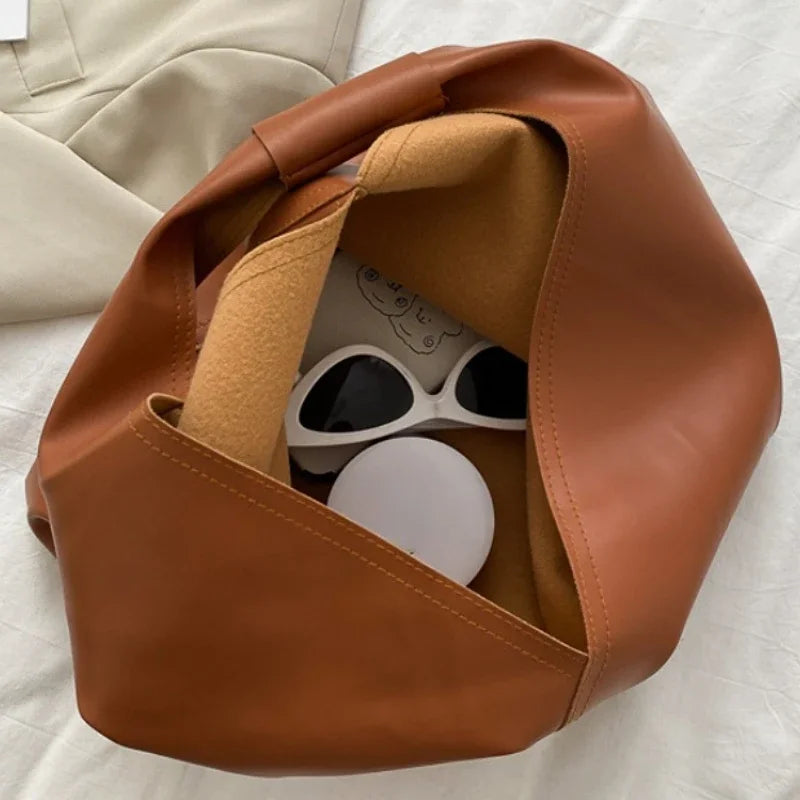 Emily – Minimalistische shopper met verstelbare riem en ruime opbergruimte