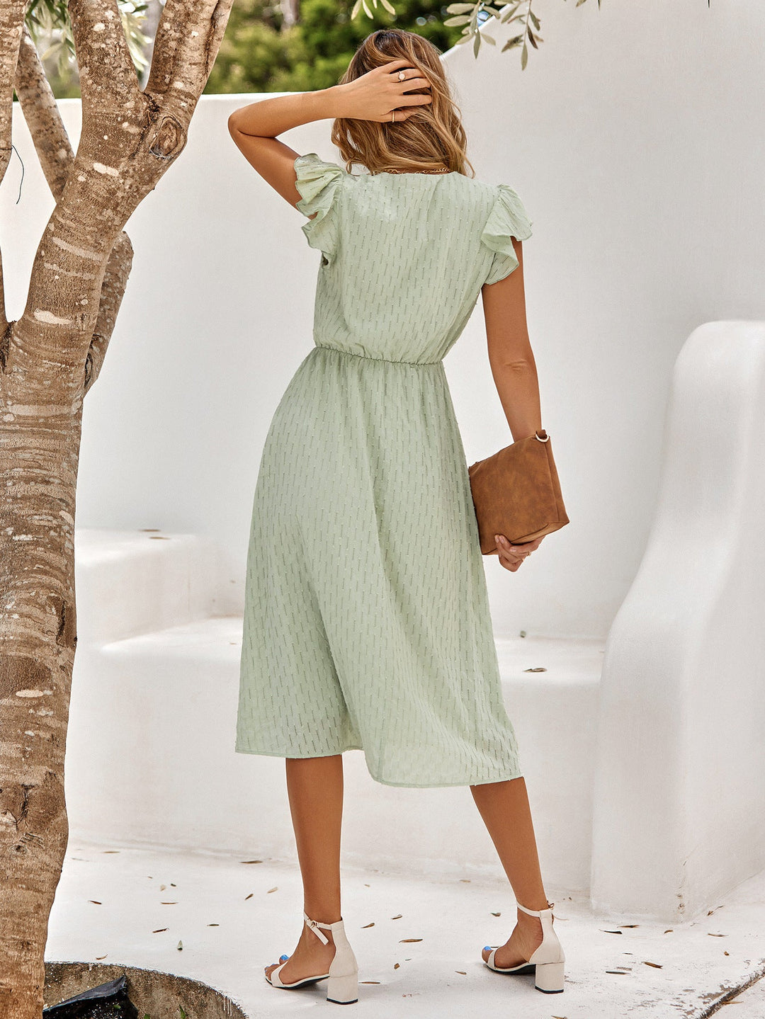 Lina - Jurk met ruchemouwen hoge taille en V hals