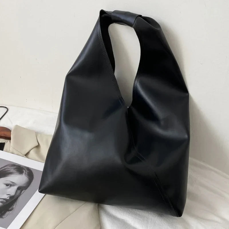 Emily – Minimalistische shopper met verstelbare riem en ruime opbergruimte