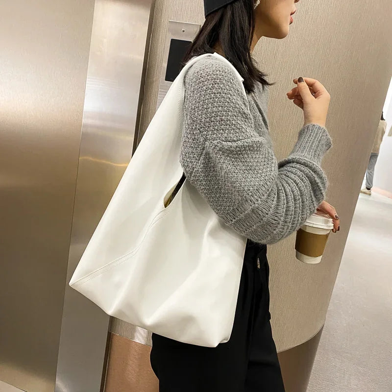 Emily – Minimalistische shopper met verstelbare riem en ruime opbergruimte