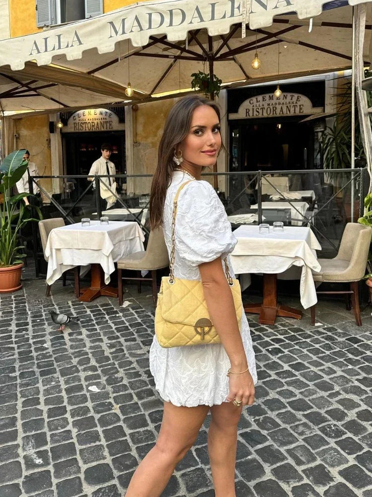 Amelia - Elegante witte jurk met een chique en speelse touch
