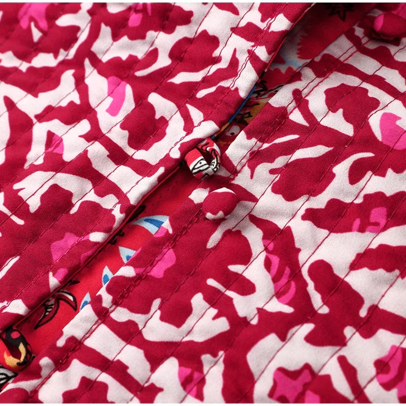 Ashley – Trendy mouwloos vest met hoge kraag en bloemenprint