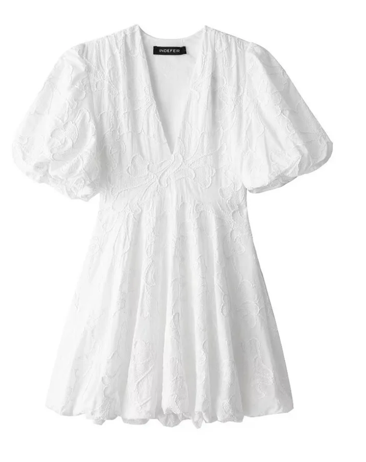 Amelia - Elegante witte jurk met een chique en speelse touch