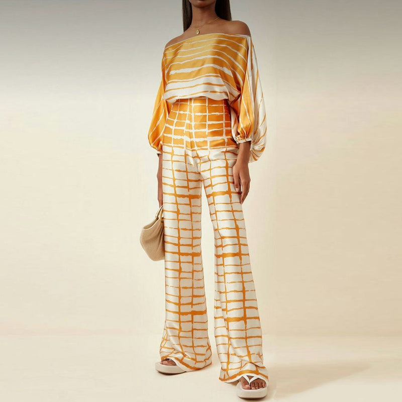 Lina - Gedurfde tweedelige jumpsuit met één-schoudermotief