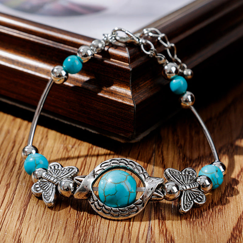 Aria – Kralenarmband met vlinderbedels en verstelbare ketting